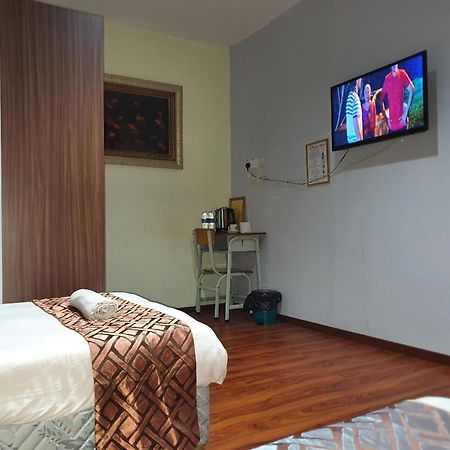 Oyo 90964 Melody 88 Inn Miri Esterno foto