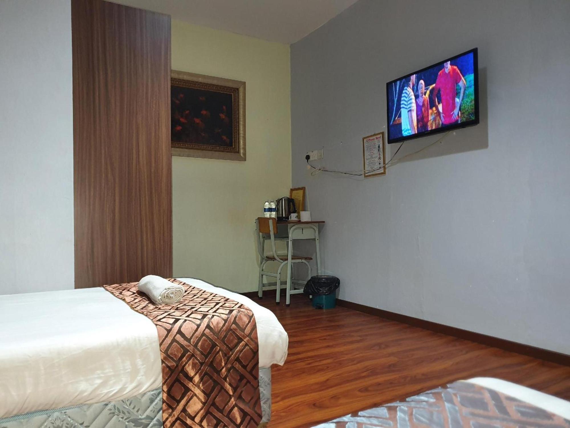 Oyo 90964 Melody 88 Inn Miri Esterno foto