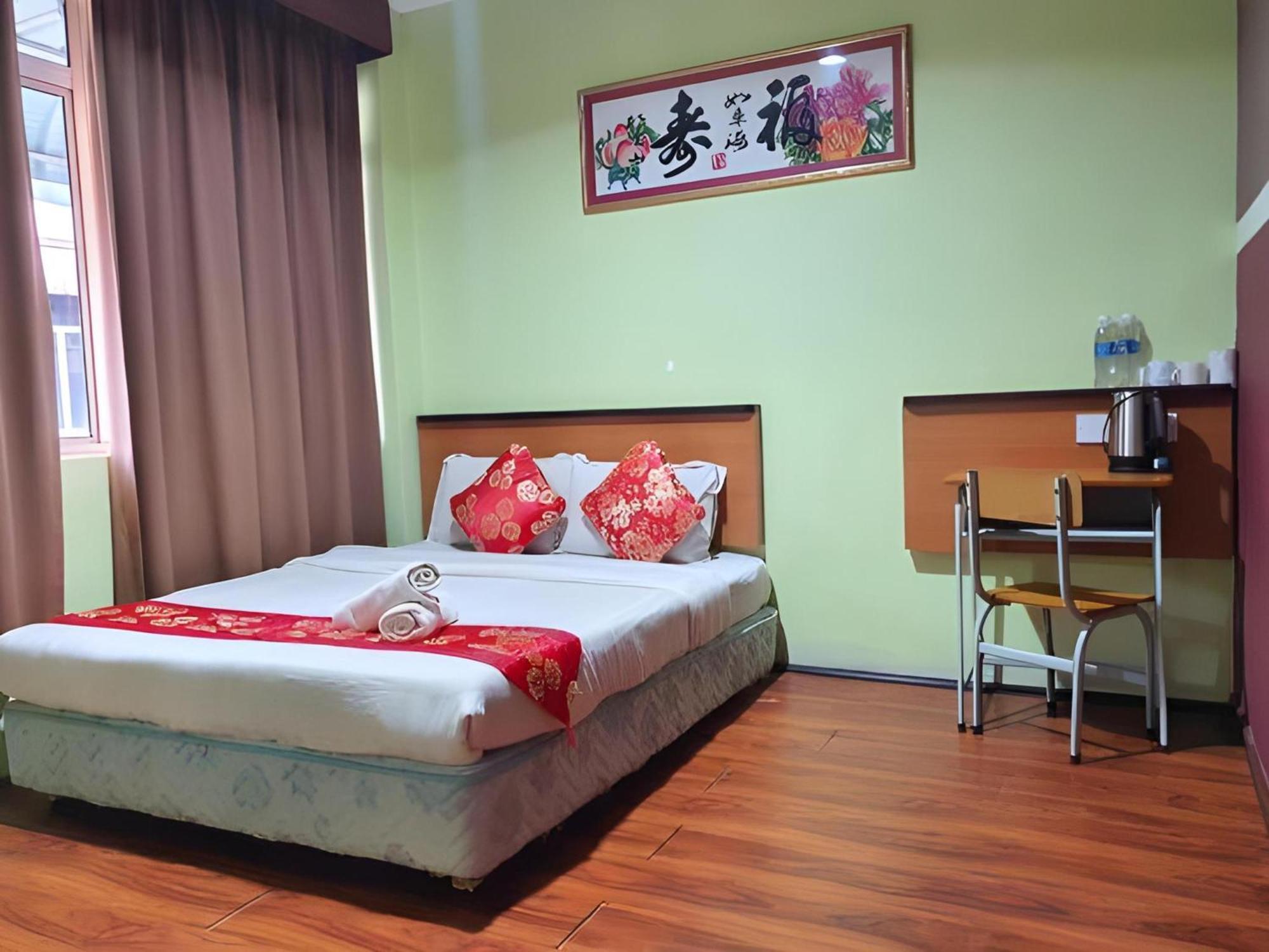 Oyo 90964 Melody 88 Inn Miri Esterno foto