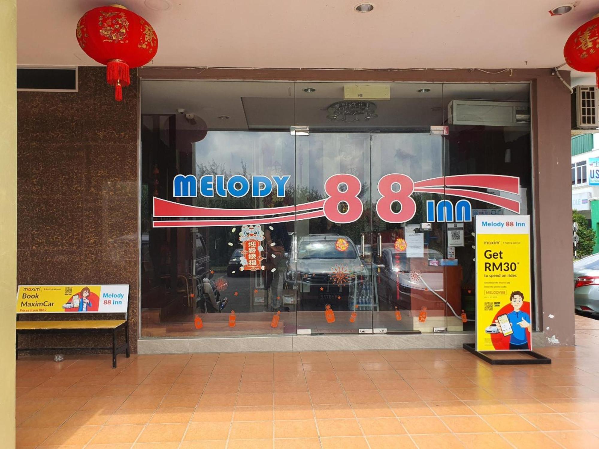 Oyo 90964 Melody 88 Inn Miri Esterno foto